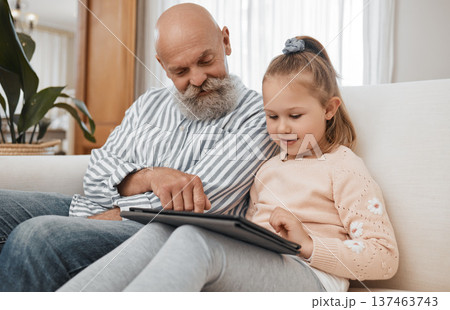 Grandfather, tablet or child elearning for education, skills development or knowledge in online class. Tech, grandfather or young girl student learning course on website or social media at home 137463743