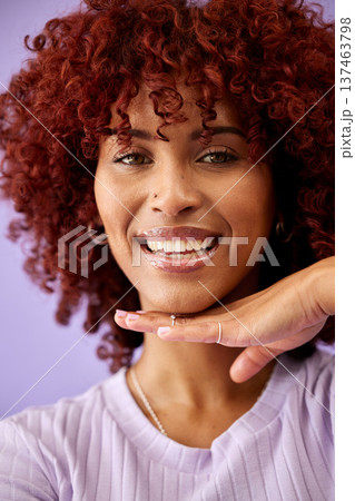 Happy, selfie and portrait of black woman with hand, smile or confidence in profile picture for social media, blog or post. African, face or happiness with natural beauty on purple background Happy, selfie and portrait of black woman with hand, smile or confidence in profile picture for social media, blog or post. African, face or happiness with natural beauty on purple background 137463798