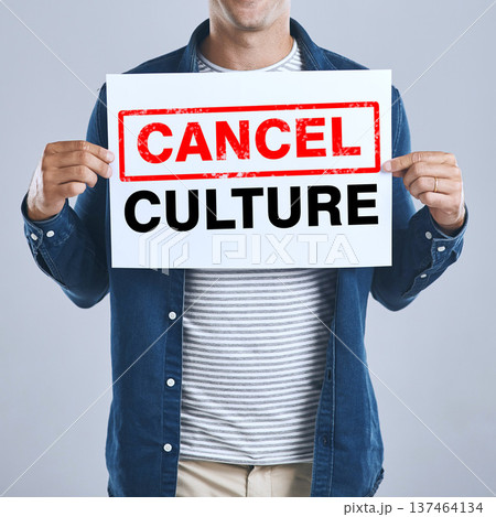 Hands of man, cancel culture and sign of censorship, bullying and isolated on a white background in studio. Poster, ban and influencer on social media for freedom of speech, politics or wrong opinion 137464134