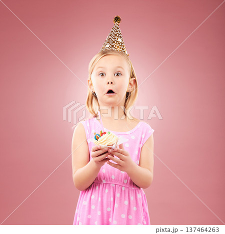 Portrait, surprise and kid with cupcake at birthday in studio isolated on a pink background mockup space. Face, wow of child and cake at party in hat at celebration, food event and shocked at dessert Portrait, surprise and kid with cupcake at birthday in studio isolated on a pink background mockup space. Face, wow of child and cake at party in hat at celebration, food event and shocked at dessert 137464263
