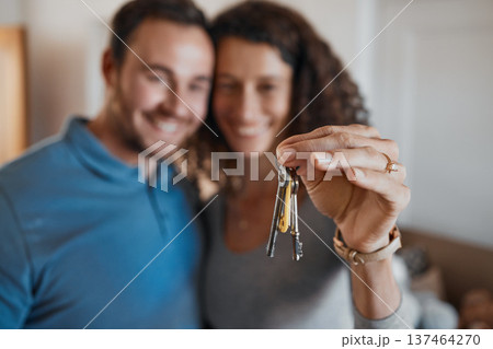 Hand, success or happy couple with house keys in real estate, property investment or buying apartment. New home blur, goal or excited man with smile or woman to celebrate moving in flat together Hand, success or happy couple with house keys in real estate, property investment or buying apartment. New home blur, goal or excited man with smile or woman to celebrate moving in flat together 137464270