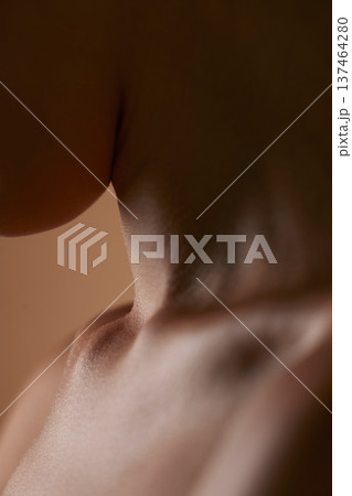 Skincare, health and closeup with neck of person in studio for beauty, textures and cosmetics. Wellness, body and aesthetic with zoom of woman on brown background for glow dermatology and glamour 137464280