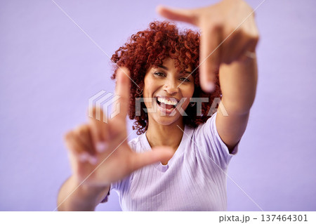 Portrait, hands frame and happy woman in studio isolated on a purple background mockup space. Face, finger border and person excited for photographer selfie, profile picture and creative perspective Portrait, hands frame and happy woman in studio isolated on a purple background mockup space. Face, finger border and person excited for photographer selfie, profile picture and creative perspective 137464301