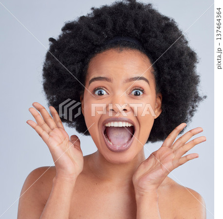 Surprise, skincare and portrait of woman in a studio for cosmetic, glamour and face routine. Shock, happy and African female model with hair treatment for afro and makeup isolated by white background Surprise, skincare and portrait of woman in a studio for cosmetic, glamour and face routine. Shock, happy and African female model with hair treatment for afro and makeup isolated by white background 137464364