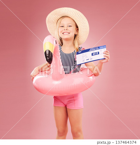 Travel, portrait and girl child with passport in studio for summer vacation or holiday on pink background. Face, ticket or kid with boarding pass, flight or traveling documents for airport compliance Travel, portrait and girl child with passport in studio for summer vacation or holiday on pink background. Face, ticket or kid with boarding pass, flight or traveling documents for airport compliance 137464374