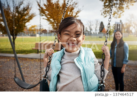 Asian family, portrait or swinging with girl child and mother outdoor together for bonding or having fun. Afternoon, playful and smile of happy daughter with single parent woman in park for break 137464517