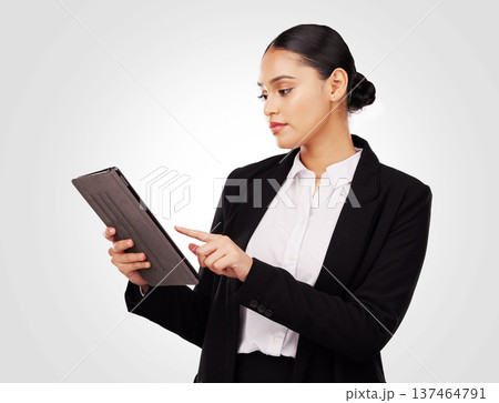 Studio, woman and lawyer working with tablet for online news, research and work information on website or white background. Reading, mobile app and typing law notes, report or email feedback 137464791