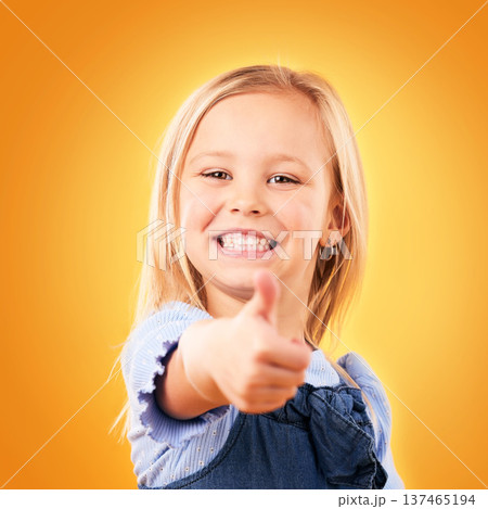 Child, happy portrait and thumbs up in studio for support, like emoji or yes for approval. Face of young girl kid on a orange background for hand gesture, icon or sign for agreement or thank you Child, happy portrait and thumbs up in studio for support, like emoji or yes for approval. Face of young girl kid on a orange background for hand gesture, icon or sign for agreement or thank you 137465194