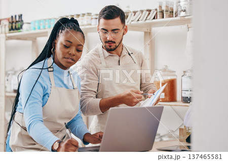 Grocery store, staff and inventory checklist with laptop at a sustainable small business. Workers, stock information and retail management planning in eco friendly and fair trade shop with employees 137465581