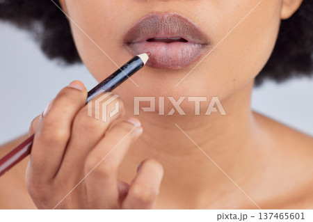 Makeup, cosmetics and lips of woman with pencil in studio for wellness, skincare product and beauty. Salon, aesthetic and face zoom of person with lipstick or lip liner for glamour, makeover and glow 137465601