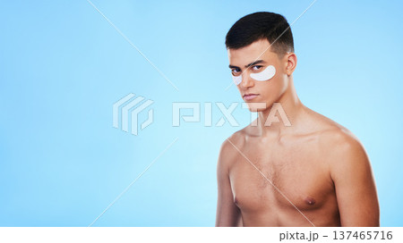 Man, beauty and banner with eye patch for skincare, grooming and clean with hygiene on blue background. Skin treatment, cosmetics product and mockup space, portrait and dermatology in a studio 137465716
