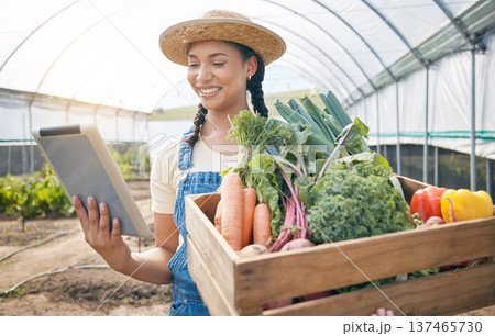 Farmer, tablet and vegetables box for agriculture, sustainability and farming in greenhouse or agro business. Person on digital technology, harvest and gardening e commerce inventory and market sales 137465730