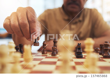Man, chess board game and hands on pawn for fun strategy, hobby and decision in challenge. Closeup, chessboard or player moving piece for winning contest, competition or learning tabletop brain games Man, chess board game and hands on pawn for fun strategy, hobby and decision in challenge. Closeup, chessboard or player moving piece for winning contest, competition or learning tabletop brain games 137465868
