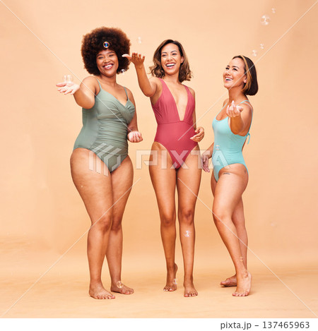 Summer, party and portrait of women with bubbles or inclusion of friends in studio background or swimming fashion. Body positivity, diversity and group of people for fun swimsuit beauty and skincare 137465963