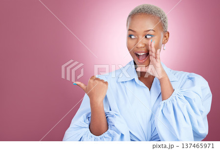 Pointing, secret and a woman in studio for surprise advertising, marketing or announcement. Happy face of an excited African person on a pink background with hand for choice, gossip or mockup space 137465971