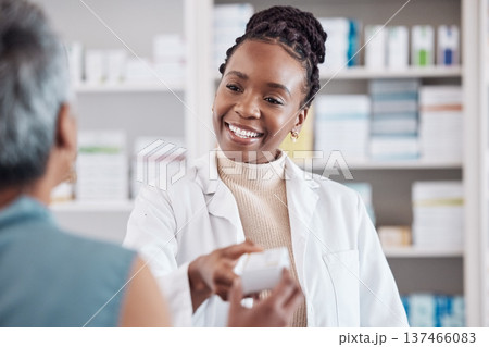 Pharmacist, medicine or black woman with pills supplements for patient for wellness or help. Pharmacy, smile or doctor giving a mature woman medical product or medication box in retail healthcare 137466083
