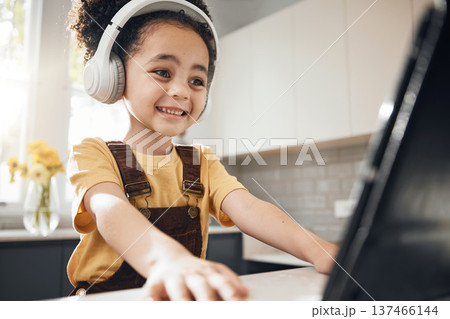 Headphones, tablet and kid elearning in home, happy and online education for homeschool. Excited, technology and boy child on video call, studying on internet and listening to music in virtual class Headphones, tablet and kid elearning in home, happy and online education for homeschool. Excited, technology and boy child on video call, studying on internet and listening to music in virtual class 137466144