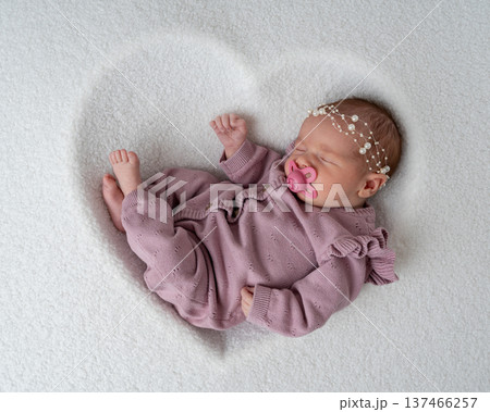 Newborn baby lying on soft white background with pacifier. Gentle newborn portrait, early childhood, care, comfort and minimal lifestyle concept. Newborn baby lying on soft white background with pacifier. Gentle newborn portrait, early childhood, care, comfort and minimal lifestyle concept. 137466257