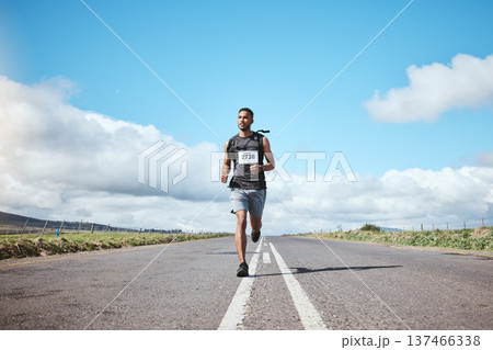 Sport, marathon runner and man on road outdoor, cardio or healthy body. Athlete, training and fitness exercise in competition, workout energy or race on street in wellness at countryside mockup space 137466338