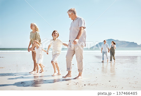 Grandparents, kids and holding hands on beach, family and parents with trust and support, tropical holiday and travel. Happiness, nature and sea with love and care, generations and people on vacation 137466485