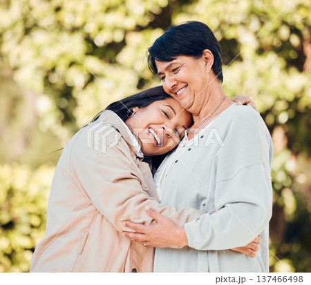 Mom, woman and portrait of hug in garden with love and happiness on mothers day or bonding with mother in retirement. Happy, family and embrace outdoor, backyard or together on holiday or vacation 137466498