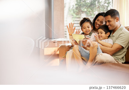Tablet, video call and family with wave, love and smile on a living room sofa at home. Mother, dad and children together with online communication of parents and kids with discussion and mockup space 137466620