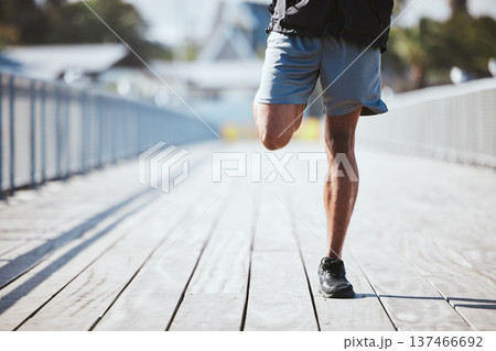 Closeup, outdoor and man stretching, legs or fitness with warm up, energy or workout with health. Zoom, person or runner with exercise, stretch or wellness with training, city or practice with sports Closeup, outdoor and man stretching, legs or fitness with warm up, energy or workout with health. Zoom, person or runner with exercise, stretch or wellness with training, city or practice with sports 137466692