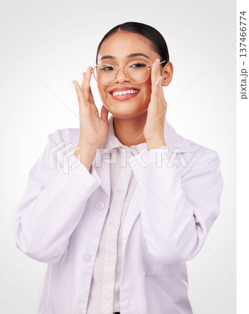 Glasses portrait, woman and vision of optometrist in studio isolated on a white background. Face smile, ophthalmologist and lens of happy medical professional optician in frame for health in eye care 137466774