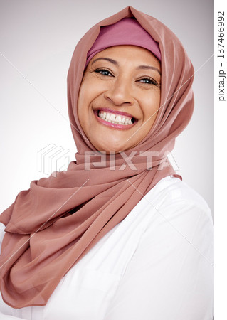 Woman, muslim and face or happy portrait in hijab for fashion, culture and religion on a white background. Islamic or arabic person from Saudi Arabia and clothes, style or smile with faith in studio Woman, muslim and face or happy portrait in hijab for fashion, culture and religion on a white background. Islamic or arabic person from Saudi Arabia and clothes, style or smile with faith in studio 137466992