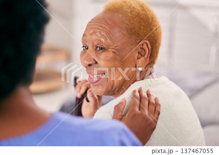 Smile, talking and a senior woman with a caregiver for medical attention, care and support in a home. Happy, love and an elderly patient with healthcare, communication or service from a nurse Smile, talking and a senior woman with a caregiver for medical attention, care and support in a home. Happy, love and an elderly patient with healthcare, communication or service from a nurse 137467055