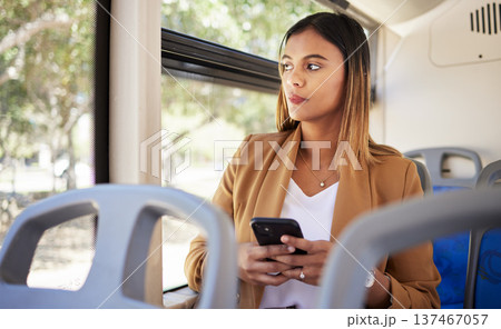 Business woman, thinking and phone on bus, transport or travel in city with social media, online news or chat. Young person driving in metro or urban journey for job, career and opportunity on mobile Business woman, thinking and phone on bus, transport or travel in city with social media, online news or chat. Young person driving in metro or urban journey for job, career and opportunity on mobile 137467057