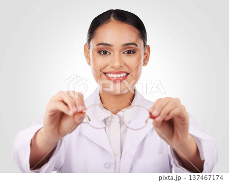 Eye care, glasses and woman, optometrist and health with vision, frame choice and lens isolated on white background. Prescription eyewear, healthcare and optometry with medical and expert in a studio Eye care, glasses and woman, optometrist and health with vision, frame choice and lens isolated on white background. Prescription eyewear, healthcare and optometry with medical and expert in a studio 137467174