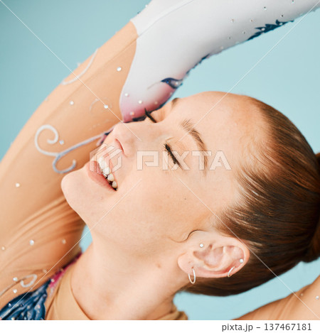 Face, gymnastics and woman, performance and sports, smile with fitness and art, young athlete and active. Gymnast, training and exercise with creativity, talent and energy with competition in arena 137467181