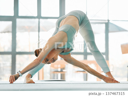 Yoga, gym or woman stretching body or ready to start gymnastics performance in training in studio. Fitness warm up, extended triangle pose or flexible girl in workout, practice or exercise in Texas Yoga, gym or woman stretching body or ready to start gymnastics performance in training in studio. Fitness warm up, extended triangle pose or flexible girl in workout, practice or exercise in Texas 137467315