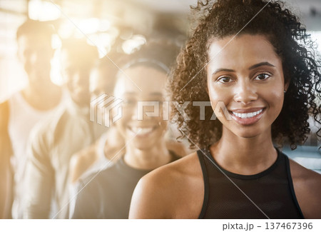 Fitness, black woman and portrait with team, workout class and training in a health and wellness club. Lens flare, happy and smile with diversity and personal trainer with exercise, sports and group 137467396
