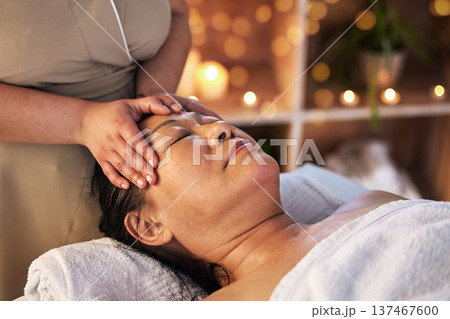 Relax head massage and senior with man in spa for wellness, facial treatment and hospitality. Peace, cosmetics and salon with customer and masseuse in hotel for health, vacation and physical therapy Relax head massage and senior with man in spa for wellness, facial treatment and hospitality. Peace, cosmetics and salon with customer and masseuse in hotel for health, vacation and physical therapy 137467600