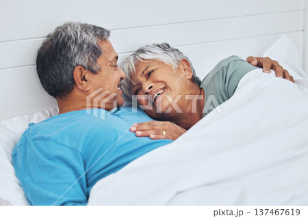 Bed, smile and senior couple with love, relax and marriage with retirement, relationship and conversation. Morning, elderly man and old woman with romance, bedroom and trust with peace, home and care Bed, smile and senior couple with love, relax and marriage with retirement, relationship and conversation. Morning, elderly man and old woman with romance, bedroom and trust with peace, home and care 137467619
