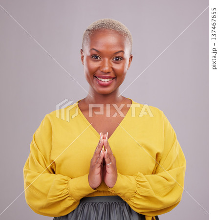 Woman, prayer and hands together in faith, religion and hope or thank you of career opportunity on studio background. Christian or african person in praying portrait, gratitude emoji and ngo business 137467655