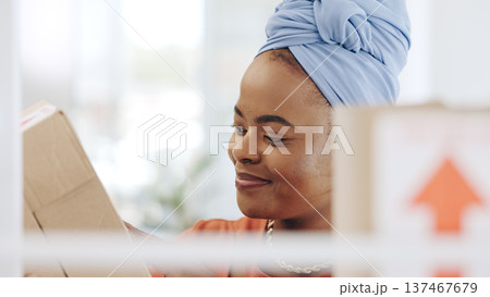 Face, box and happy black woman packaging stock product, store delivery or retail distribution shipping. Logistics export, cardboard container and African small business owner working on supply chain 137467679