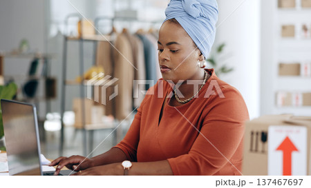 Laptop, ecommerce and black woman typing online search for stock product, store delivery or retail distribution info. Logistics, computer and small business owner working on supply chain research 137467697