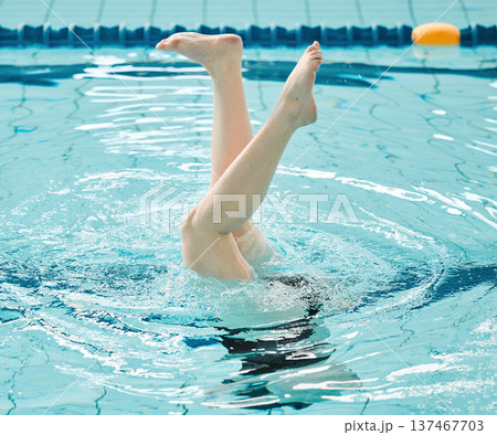 Swimming, athlete and legs in water upside down, exercise and training for healthy body. Pool, feet and person alone in synchronized workout, sport art and practice for fitness in wellness underwater Swimming, athlete and legs in water upside down, exercise and training for healthy body. Pool, feet and person alone in synchronized workout, sport art and practice for fitness in wellness underwater 137467703