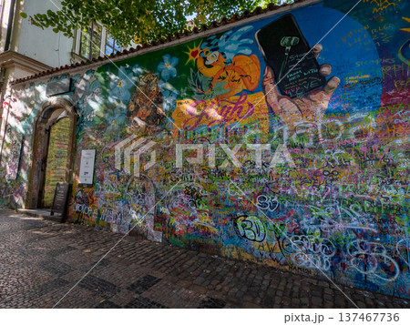 Lennon Wall in the Mala Strana district of Prague, Czech Republic. Lennon Wall in the Mala Strana district of Prague, Czech Republic. 137467736