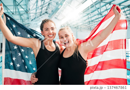 Athlete women, american flag and celebration for win, fitness or excited smile in portrait at sports contest. Girl team, winner and hug by swimming pool for success, exercise and goals at competition 137467861