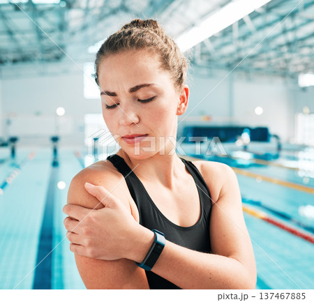 Sports injury, shoulder pain and fitness with woman at swimming pool for medical, training and health. First aid, emergency and accident with person for muscle ache, inflammation and problem 137467885
