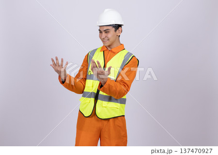 Construction worker shrugging shoulders in doubt 137470927