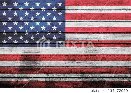 Distressed American flag texture on wooden background Distressed American flag texture on wooden background 137472030