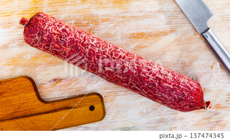 Iberian dry-cured salchichon from lean pork meat marinated without paprika Iberian dry-cured salchichon from lean pork meat marinated without paprika 137474345