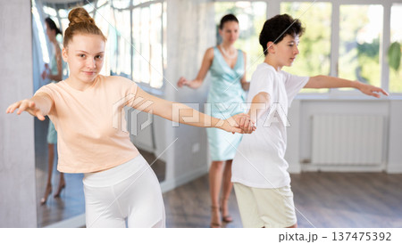 Swing dance training in choreographic studio 137475392