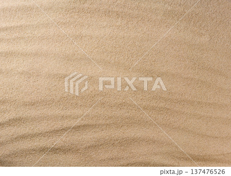 Sand background texture as background, top view.close up the texture of the sand on the beach, topview. 137476526