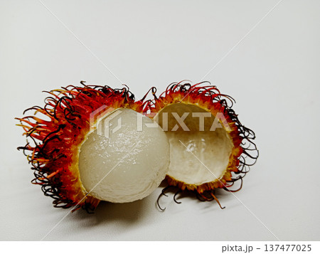 Rambutan fruit on white background. Rambutan bears fruit once a year Rambutan fruit on white background. Rambutan bears fruit once a year 137477025